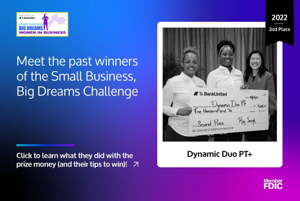 women holding check with text