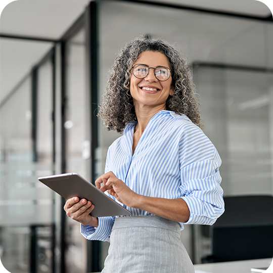 woman smiling with tablet
